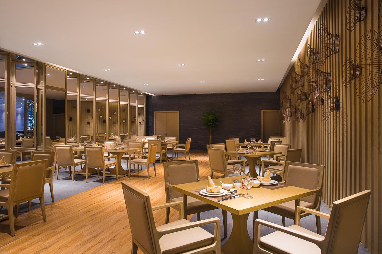 Grand New Century Hotel Санья Экстерьер фото